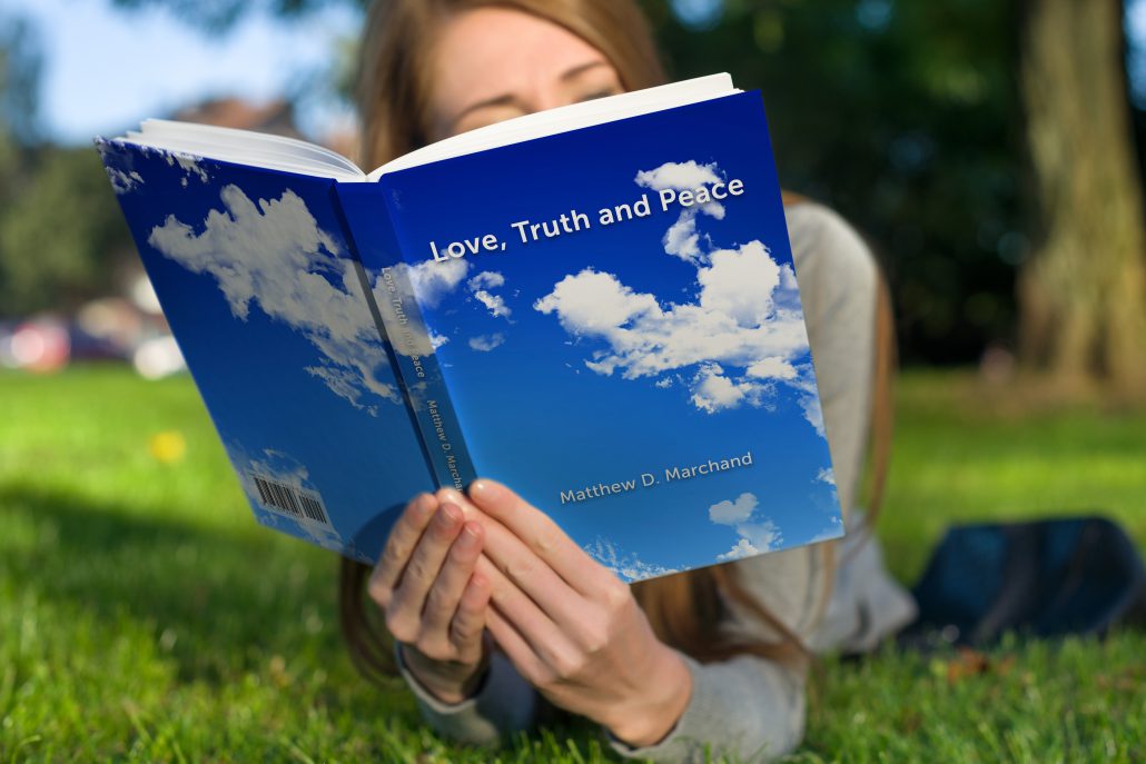 Person reading Love, Truth and Peace